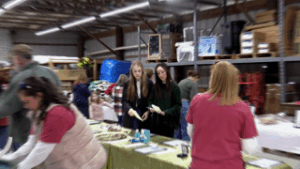 Jill Cotton (right) participates in a Students in Action project
